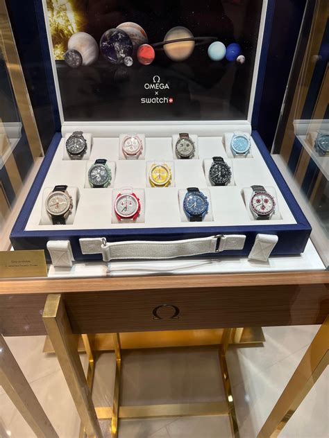 omega x swatch stores.